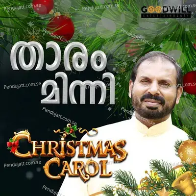 Tharam Minni - Fr. Shaji Thumpechirayil album cover 